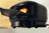 Black Gozney oven with a pizza inside on a wooden surface